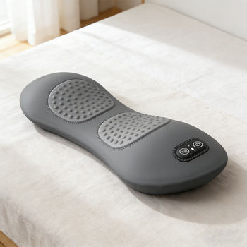 Person using REVILIO for back pain relief